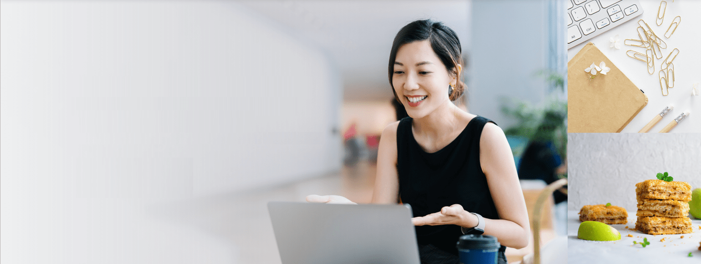 Woman using a laptop to check Woolworths at Work benefits for Supplier & Financial teams.