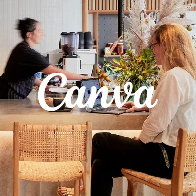 A lady working with laptop at the bar