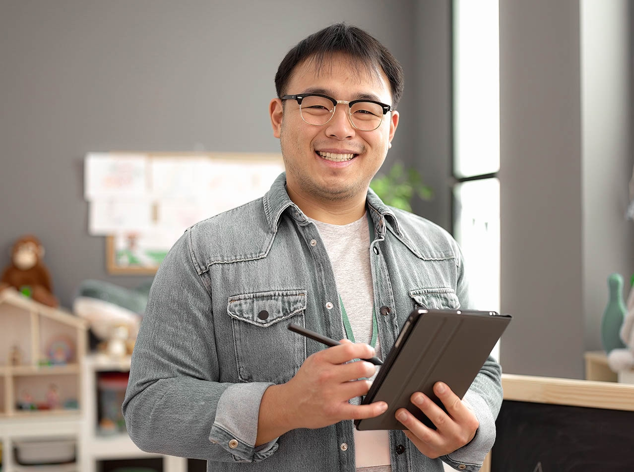 Early learning educator with tablet