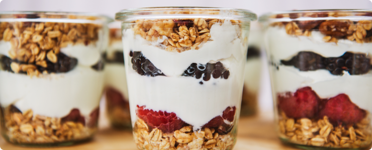 yoghurt muesli cups with fresh blueberries and raspberries
