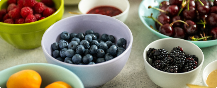 bowl of blueberries, cherries, blackberries, raspberries