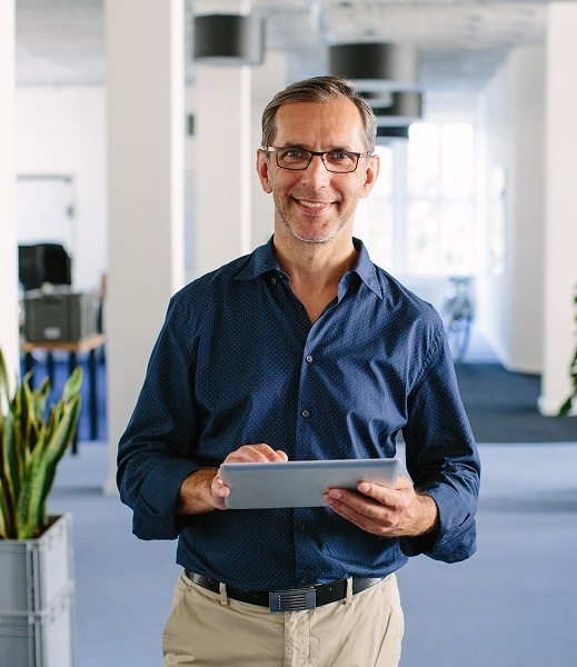office worker man holding tablet computer